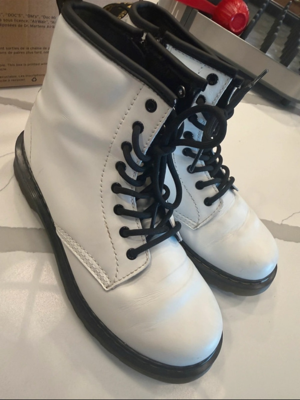Dr. Martens White Lace-Up Combat Boots with Black Trim